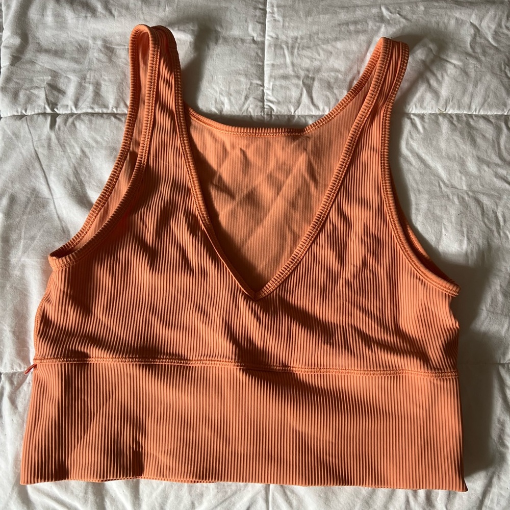 Lululemon pivot tank in orange, no tags but fits like an 8/10!